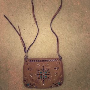 Beige leather purse with rhinestone detail